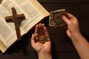 Pastor accused of bribing police officer to dig up dirt on rival pastor in church leadership dispute