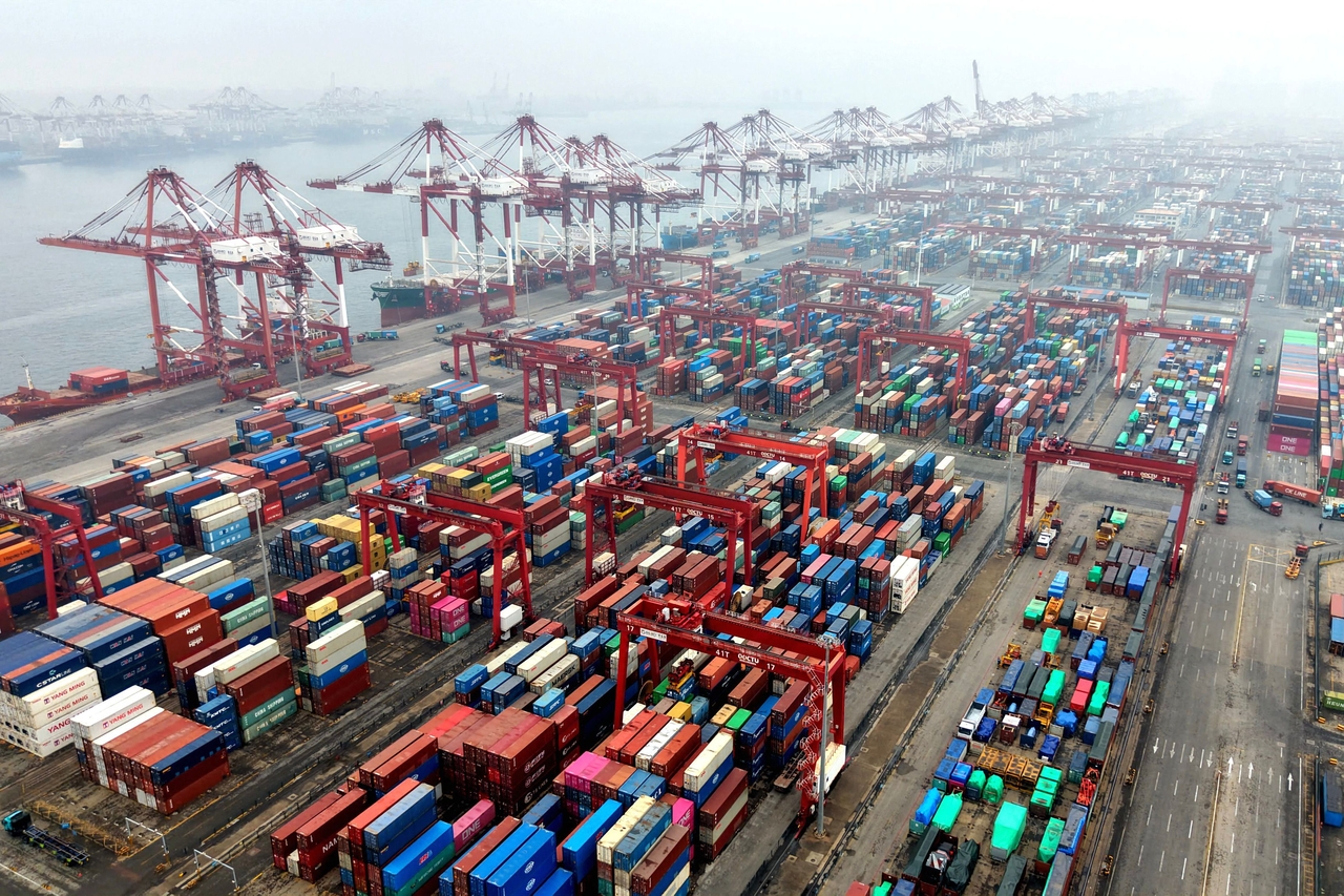 Cargo containers are seen at a port in Qingdao, eastern China's Shandong province on Tuesday.   AFP-Yonhap