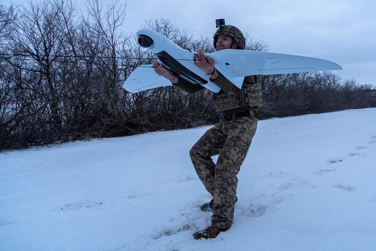 A Ukrainian soldier of the 48th separate brigade launches a reconnaissance drone in Kharkiv region, Ukraine, Wednesday. (AP-Yonhap)
