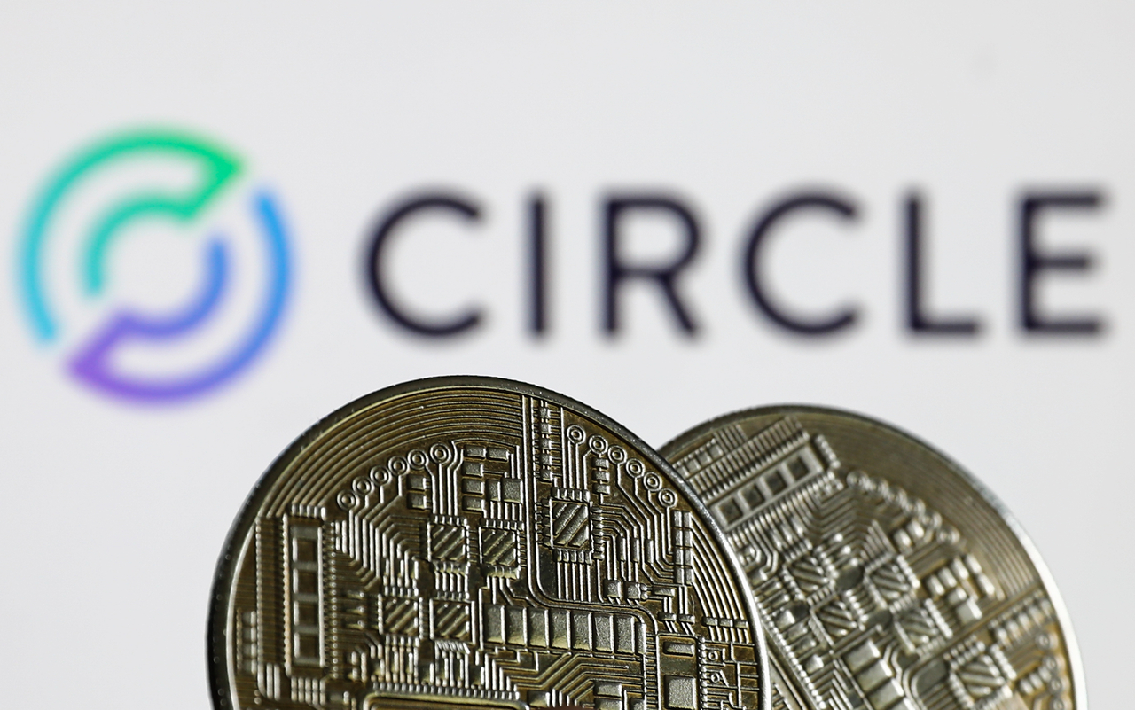 Images of coins representing cryptocurrency with the Circle logo in the background (Getty Images)