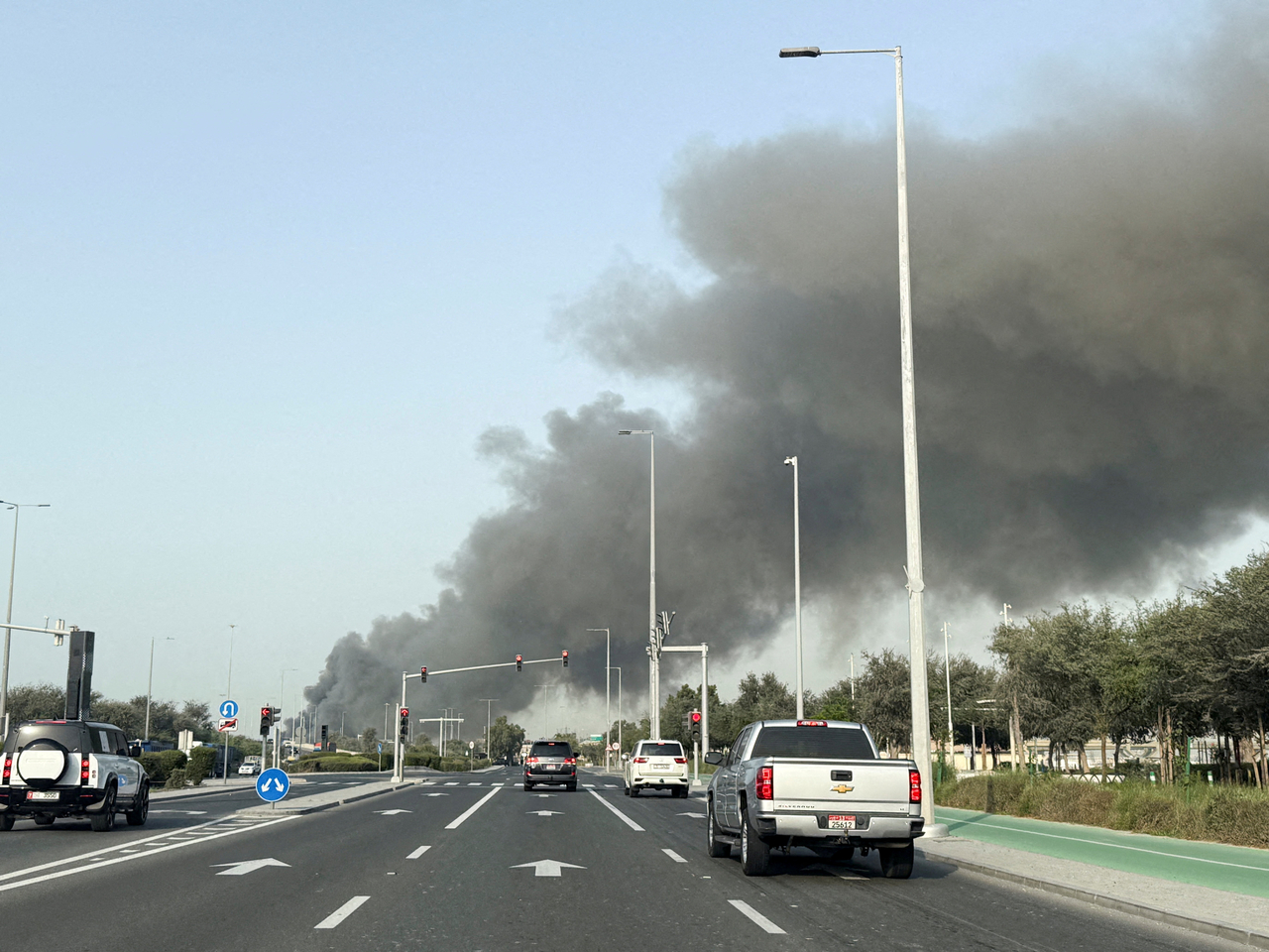 Smoke billows from Zayed port after an Iranian attack, following United States and Israel strikes on Iran, in Abu Dhabi, United Arab Emirates, on Sunday. (Reuters)