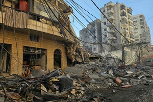 Israel strikes Beirut hotel as toll rises