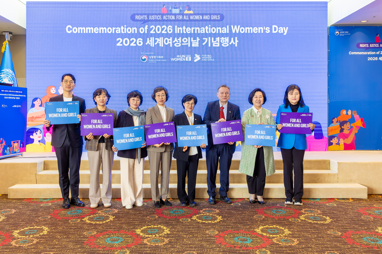 Speakers pose for a photo at an event hosted by the UN Women Knowledge and Partnerships Center in the Republic of Korea to commemorate International Women’s Day on Wednesday. (UN Women)