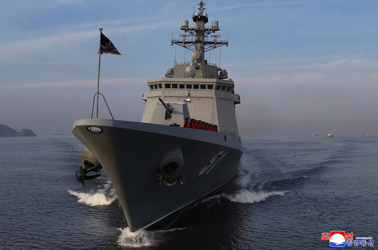 North Korean leader Kim Jong-un oversaw a cruise missile test launch from the destroyer Choe Hyon on March 10 via video link, state media reported Wednesday. (Yonhap)