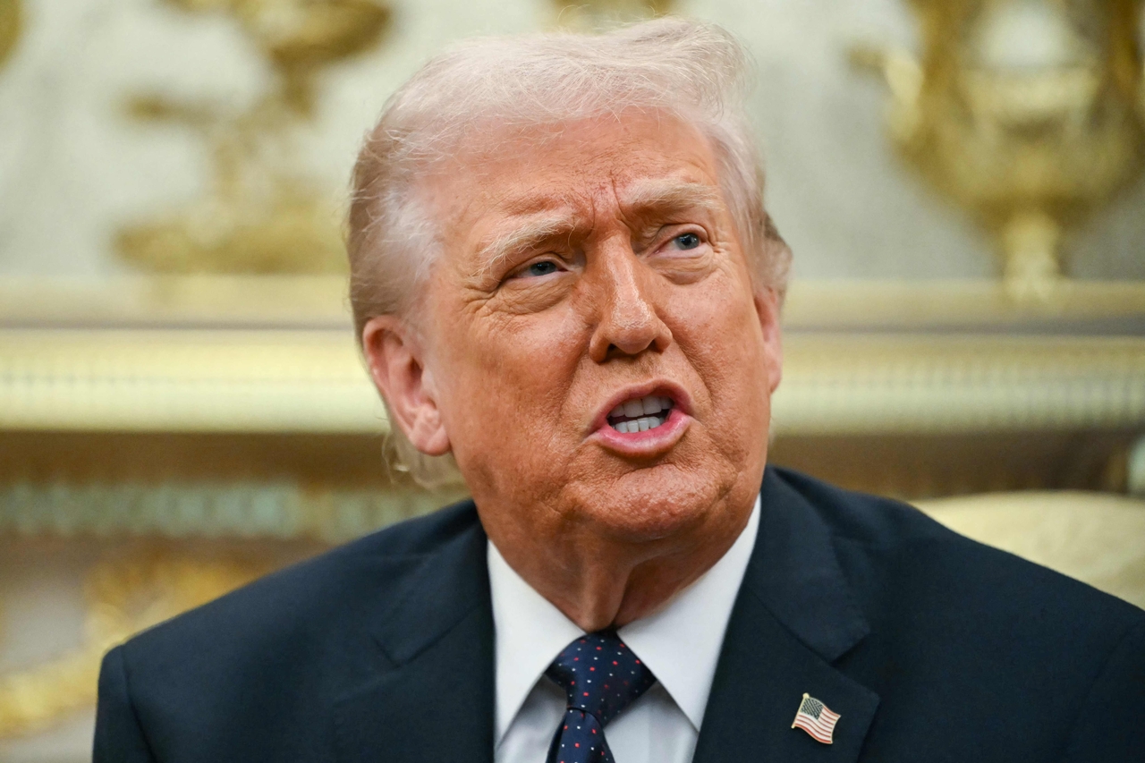 US President Donald Trump speaks during a meeting with German Chancellor Friedrich Merz in the Oval Office of the White House in Washington on March 3. (AFP-Yonhap)