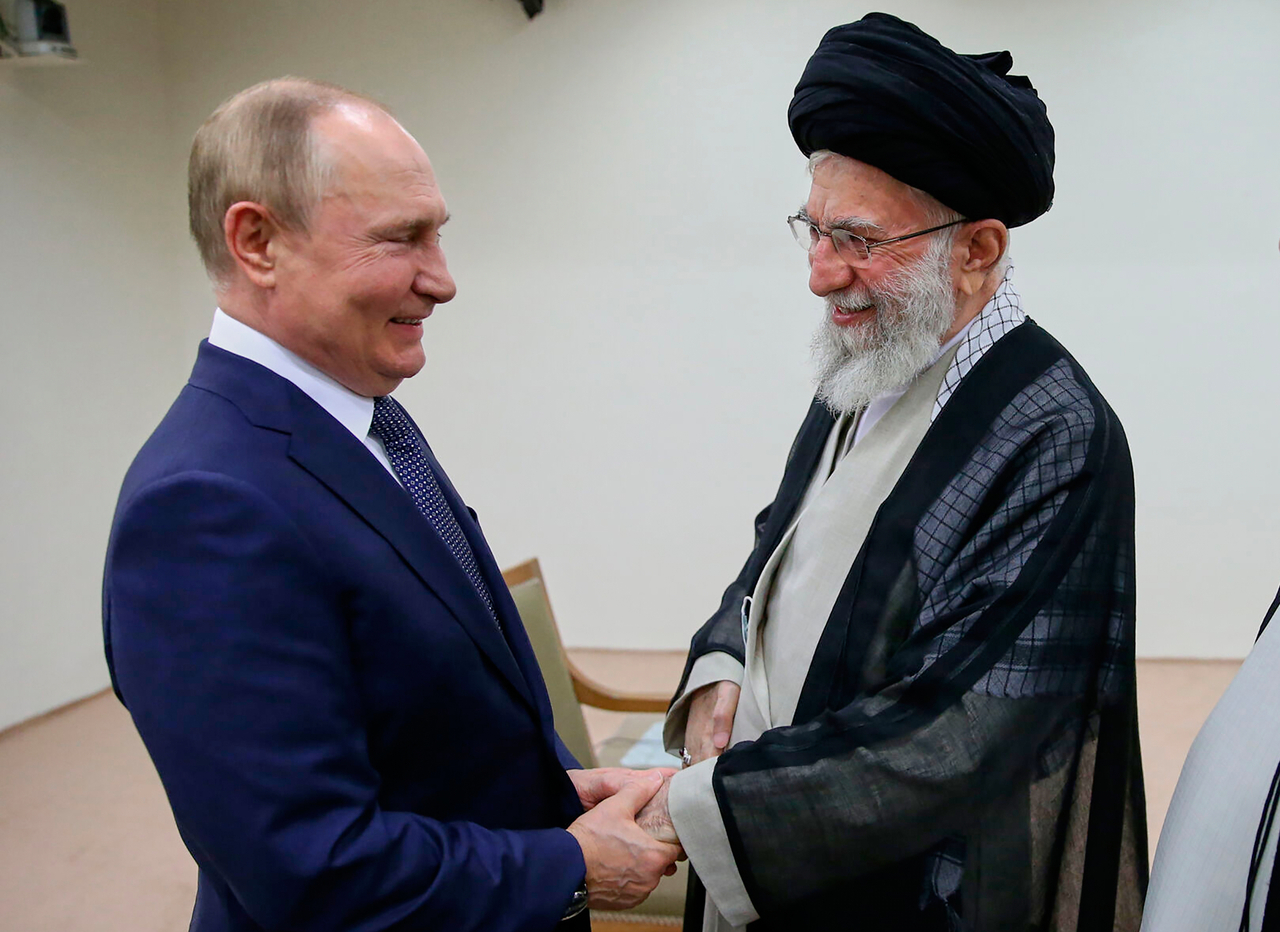 In this picture released by the official website of Iranian Supreme Leader Ayatollah Ali Khamenei, he and Russian President Vladimir Putin greet each other on July 19, 2022, during a meeting in Tehran, Iran. (Office of the Iranian Supreme Leader via AP, File)