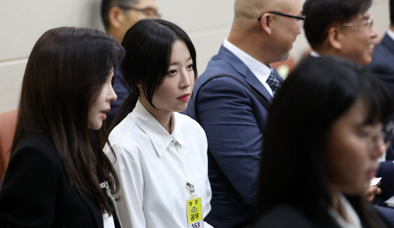 Popular mukbang YouTuber Tzuyang (second from left) attends a parliamentary audit as a witness at the National Assembly in Seoul on Oct. 14, 2025. (Newsis)
