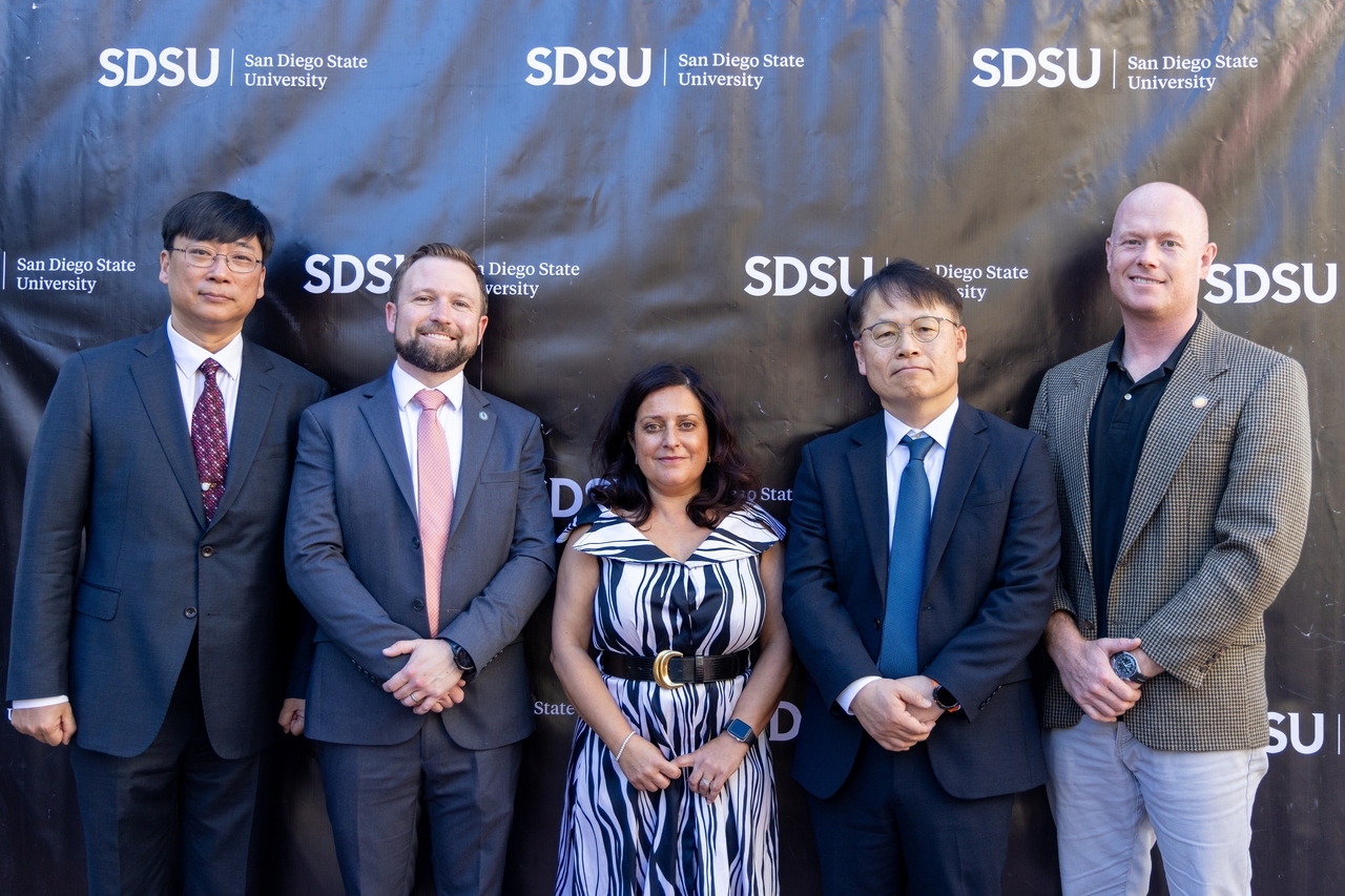 Officials from Samsung Heavy Industries, San Diego State University and the City of San Diego pose for a photo during the opening ceremony of the SHI-SDSU Advanced Maritime Center in San Diego. From left: Kim Hyun-jo, vice president and head of Samsung Heavy Industries’ research institute; Ben Moore, chief of global partnerships for the City of San Diego; Hala Madanat, vice president for research and innovation at SDSU; Lee Wang-keun, chief operating officer of Samsung Heavy Industries; and John Aasted, public administration graduate student at the City of San Diego’s Human Resources Department. (Samsung Heavy Industries)