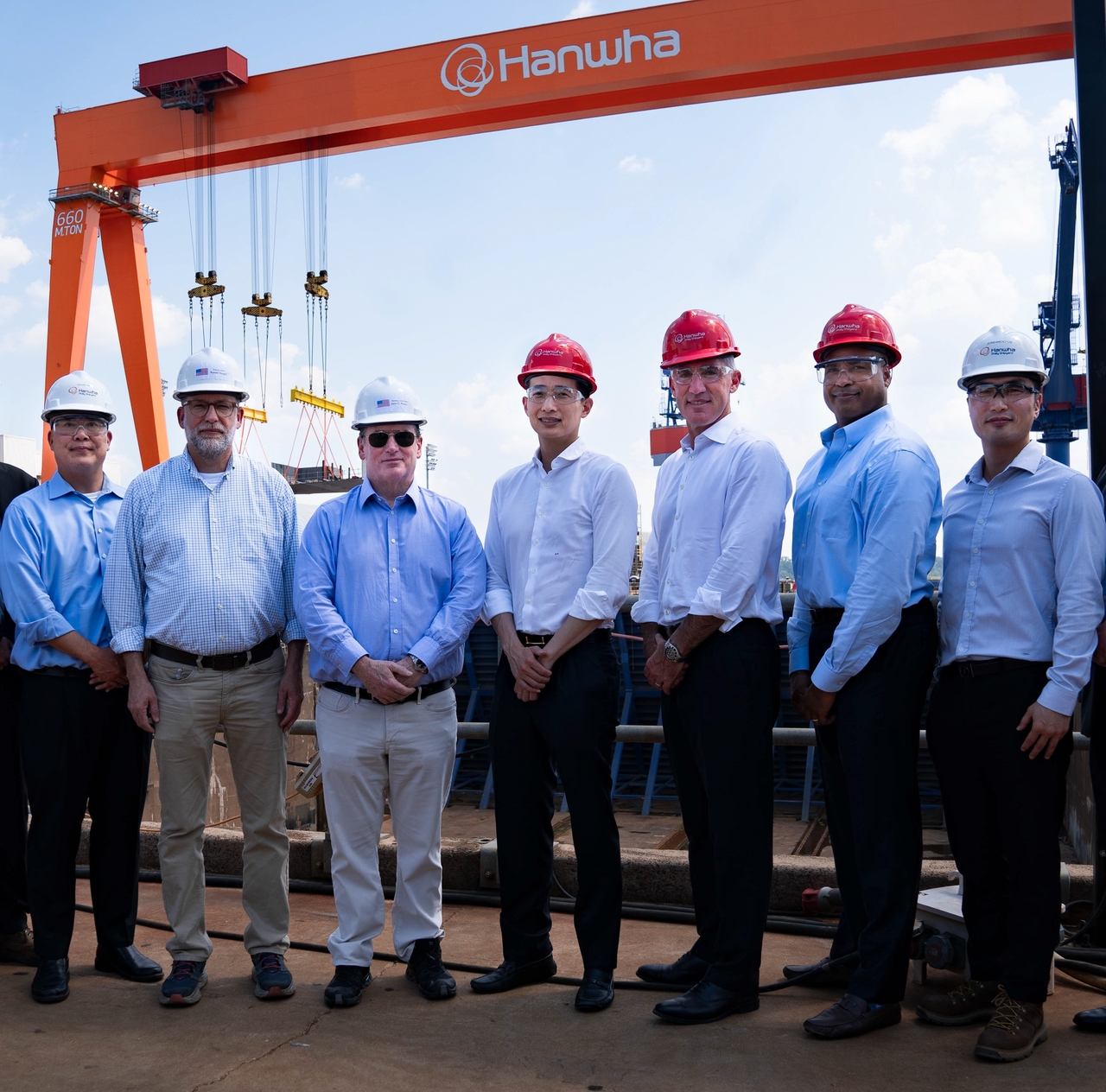 Russell Vought, director of the Office of Management and Budget (second from left), US Navy Secretary John Phelan (third from left) and Hanwha Group Vice Chair Kim Dong-kwan (fourth from left) pose for a photo on July 30 after touring the Hanwha Philly Shipyard in the US. (Hanwha Group)