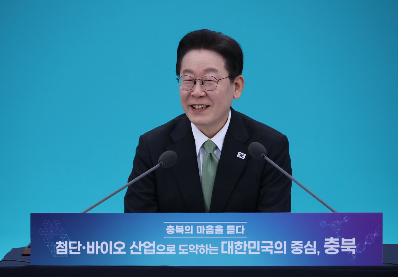 President Lee Jae Myung speaks during a town hall meeting with residents in North Chungcheong Province held in the central city of Cheongju on Friday. (Yonhap)