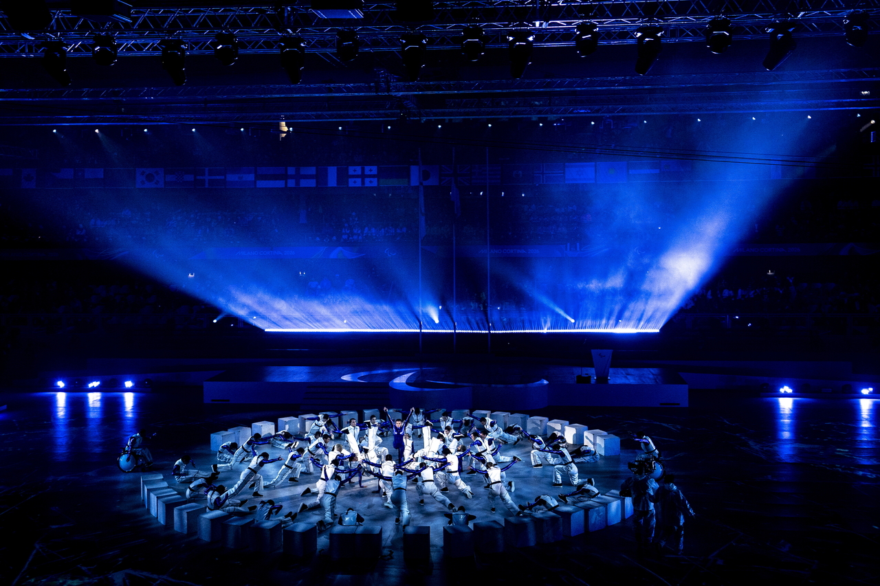 Dancers perform during the Closing Ceremony of the Milan Cortina 2026 Paralympic Winter Games, in Cortina d'Ampezzo, Italy, Sunday.   (EPA-Yonhap)