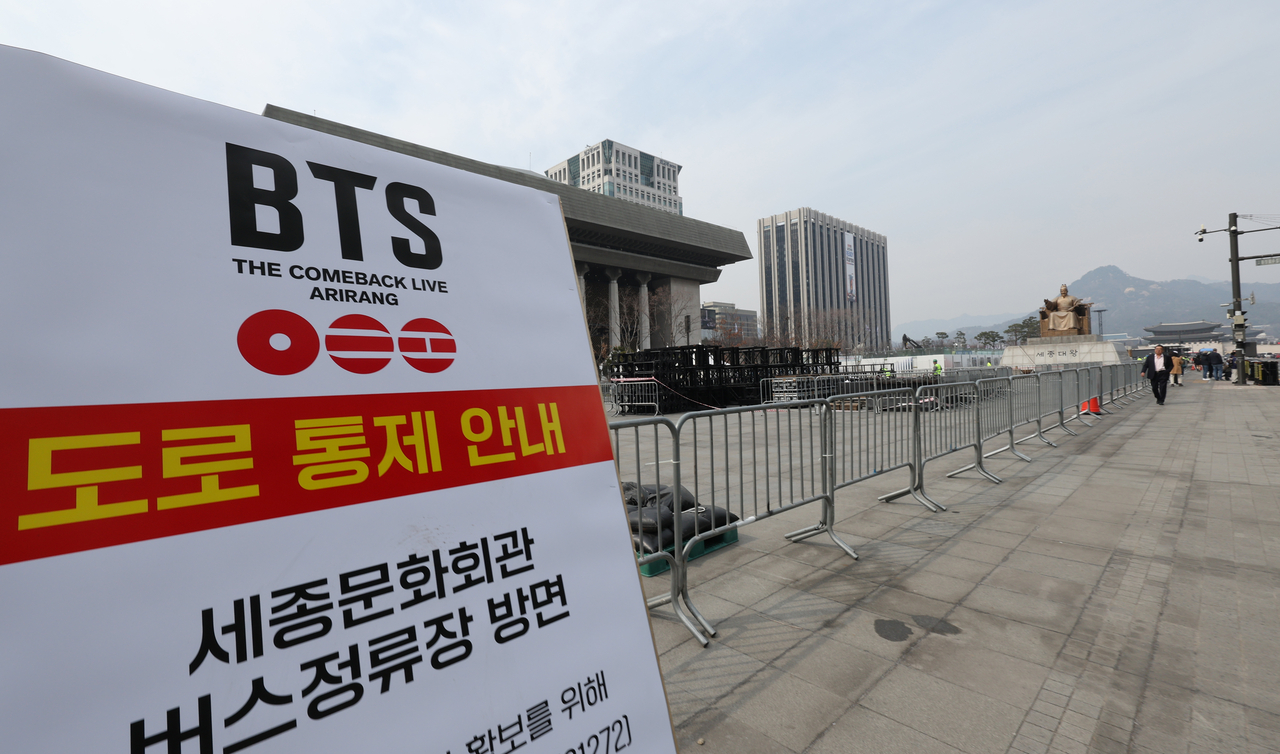 A sign informs the public of road closures around Gwanghwamun Square ahead of BTS’ comeback concert in Seoul on Monday. (Yonhap)