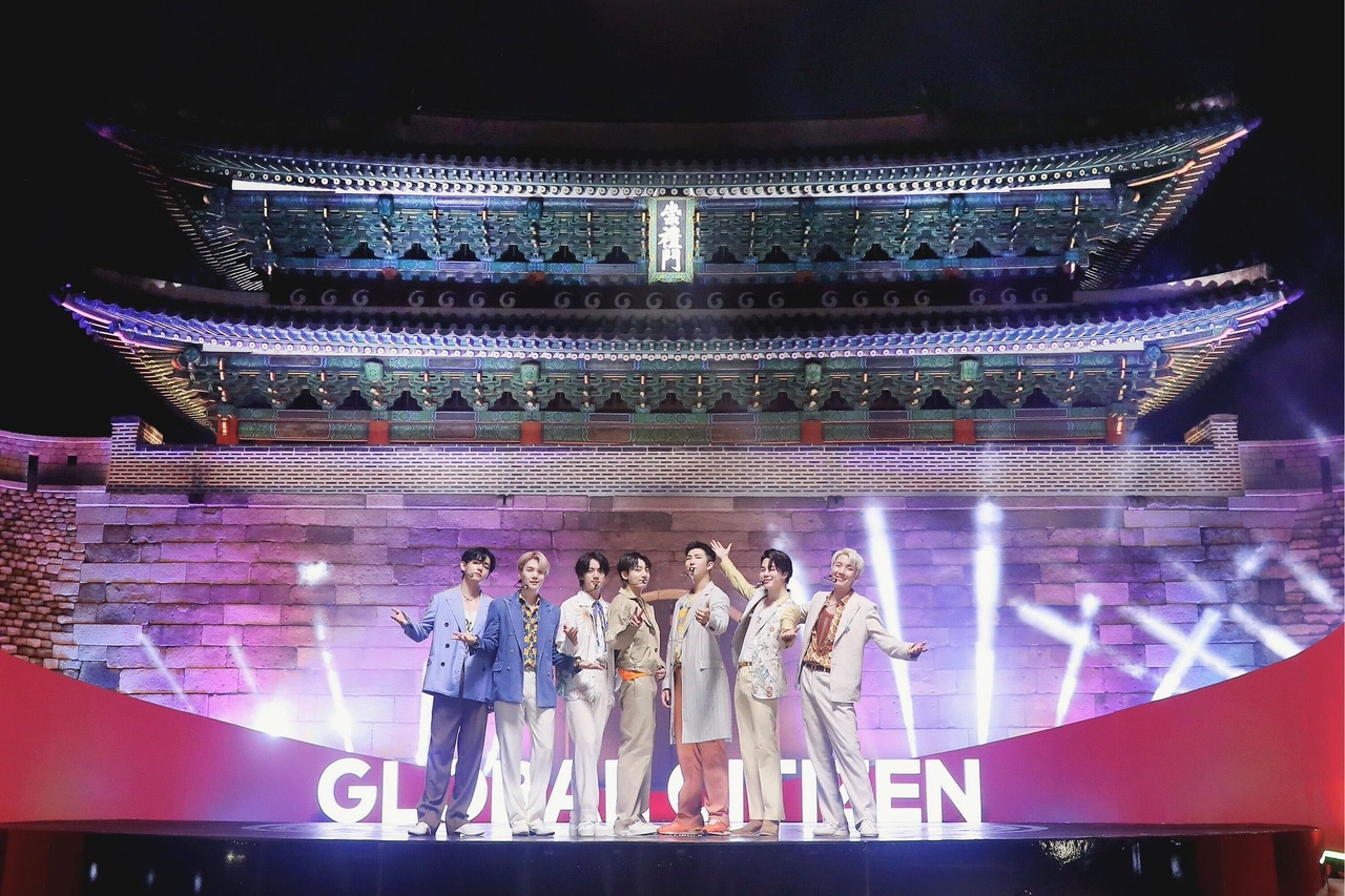BTS poses in front of Sungnyemun ahead of its live performance of "Permission to Dance" in 2021. (Big Hit Music)
