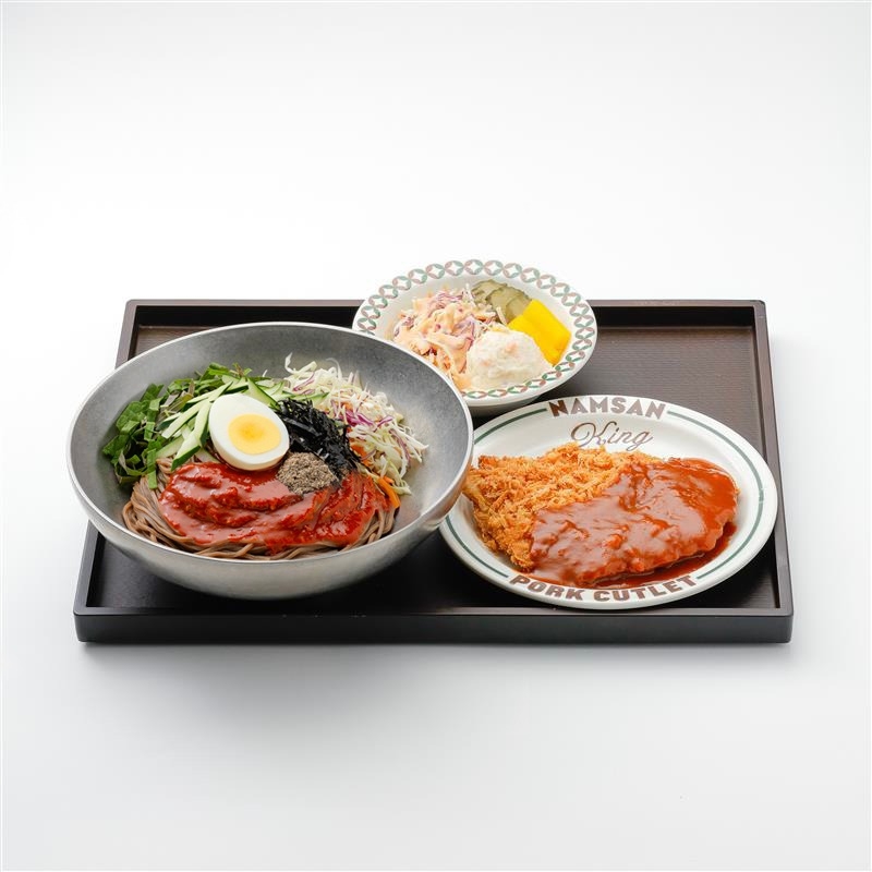 The “BTS The City Welcome & Farewell Set,” which includes spicy perilla oil buckwheat noodles and tonkatsu. (Ourhome)