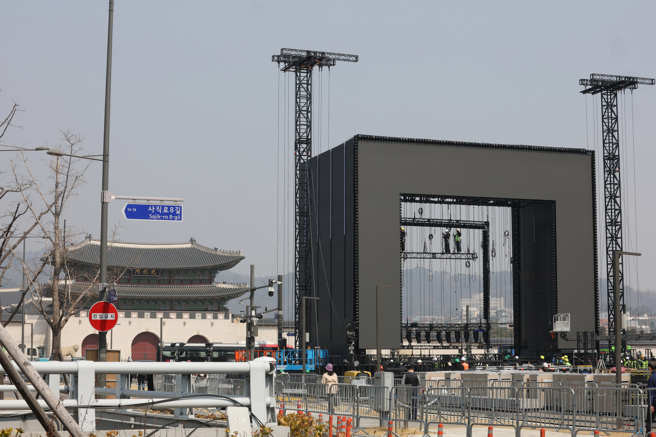 Stage installation work is underway at Gwanghwamun Square in central Seoul on Tuesday, ahead of the BTS concert to be held there Saturday. (Yonhap)