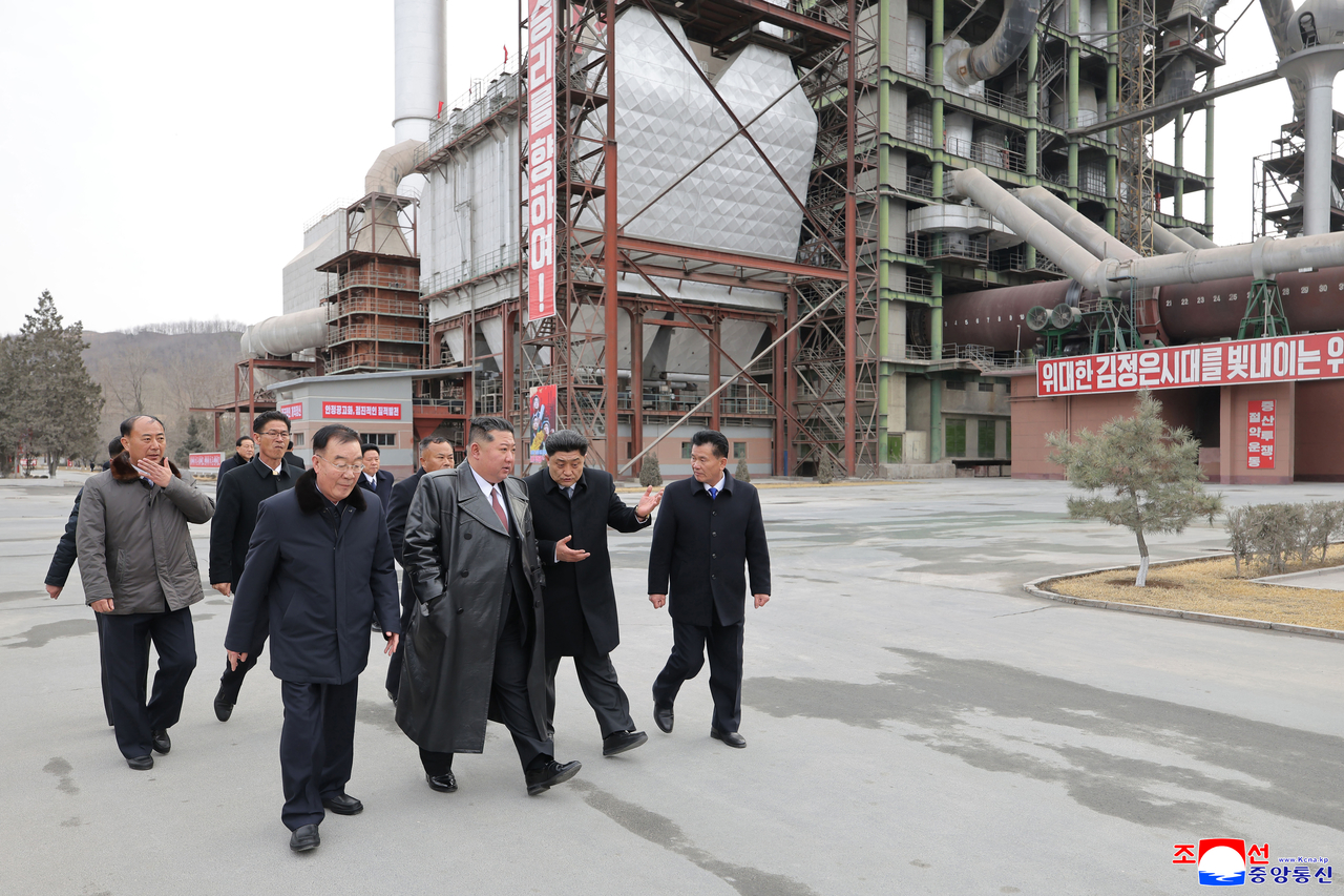 North Korean leader Kim Jong-un (3rd from right) visits the Sangwon Cement Complex in the central province of North Hwanghae on March 1. (KCNA via Yonhap)