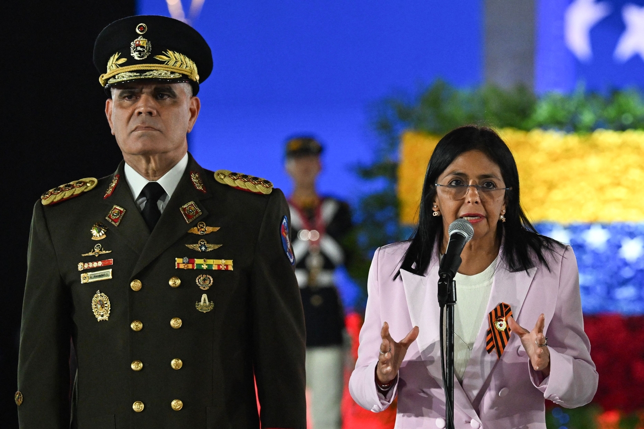 Venezuela's then-Vice President Delcy Rodriguez (right) speaks next to Venezuelan Defense Minister General Vladimir Padrino Lopez during a military parade in Caracas, Venezuela, May 13, 2025. (AFP-Yonhap)