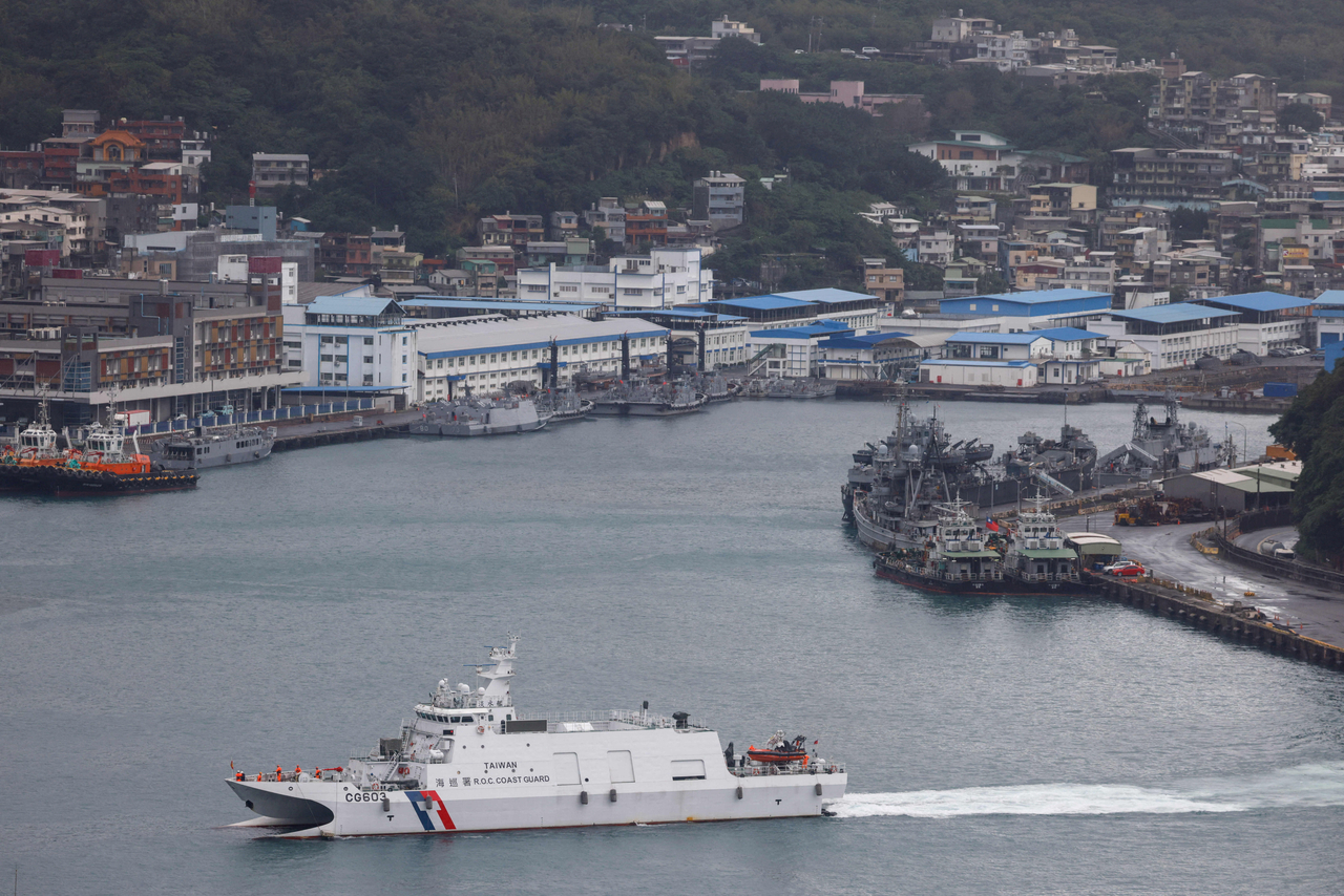 A Taiwan Coast Guard patrol vessel moves in Keelung, as China conducts "Justice Mission 2025" military drills around Taiwan, in Keelung, Taiwan, in December 2025. (Reuters-Yonhap)