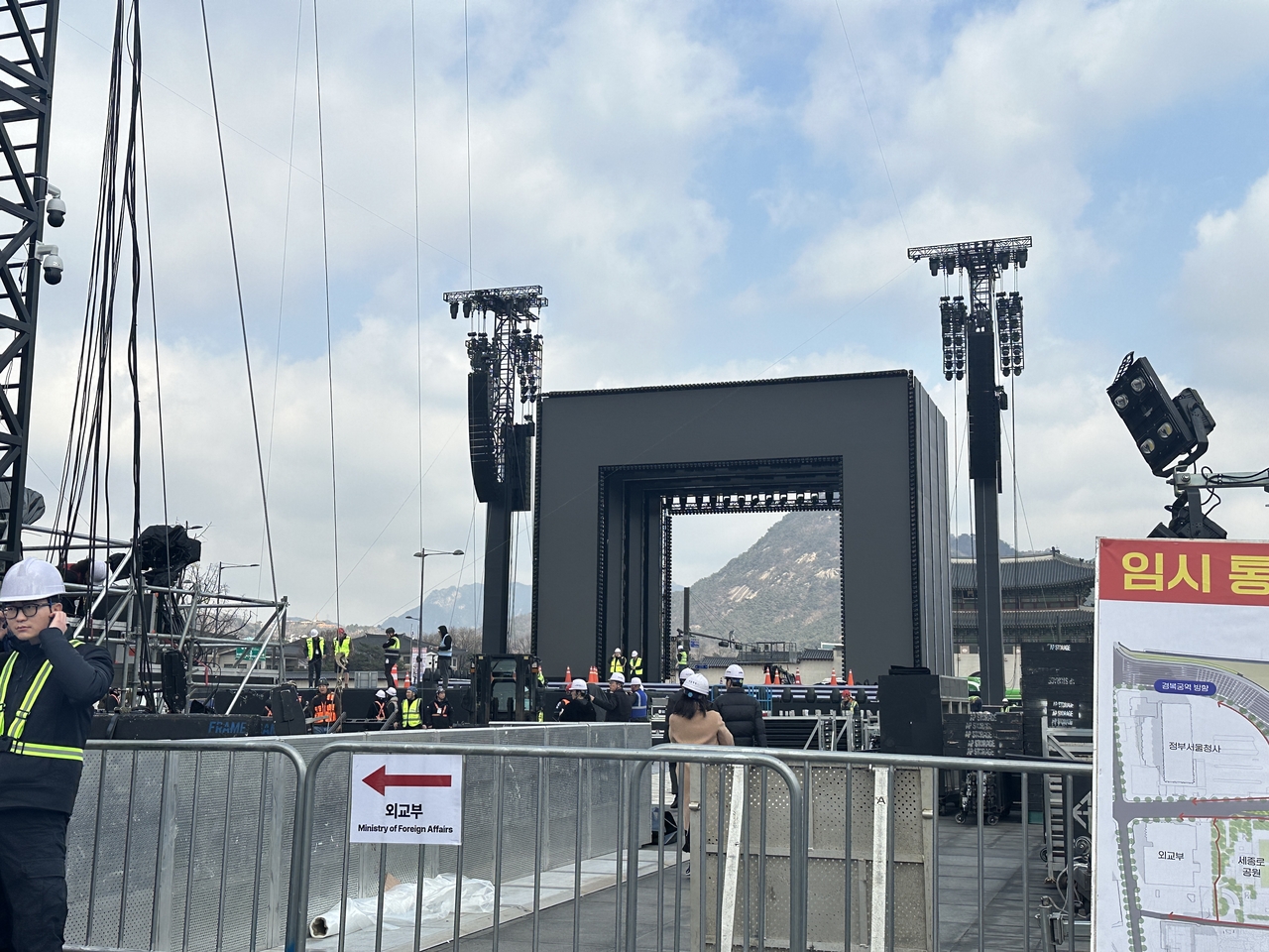 Stage installation is nearing completion for BTS' comeback concert at Gwanghwamun Square in central Seoul, Friday (Lee Jung-joo/The Korea Herald)