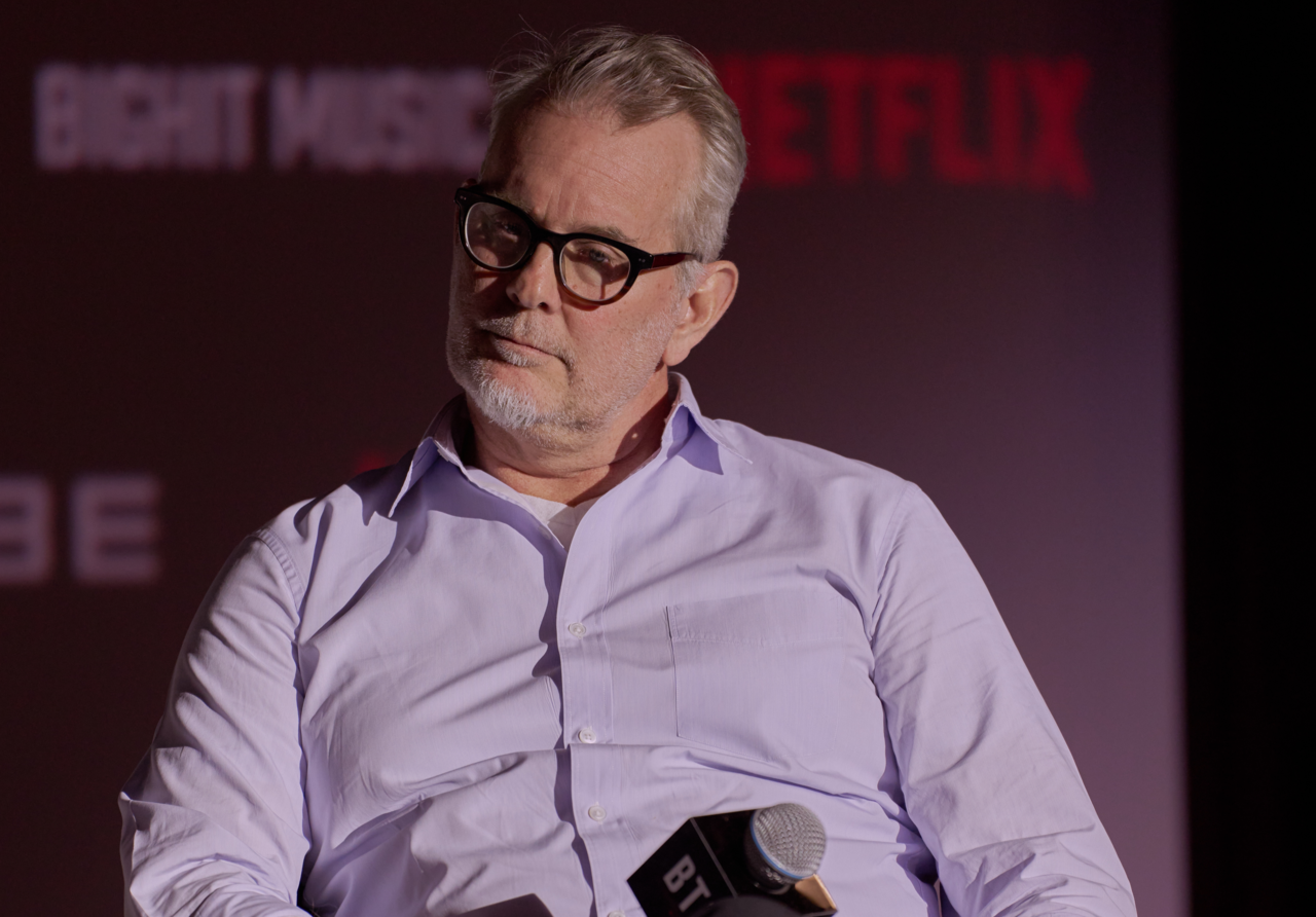 Executive producer Garrett English speaks at a press briefing for BTS 