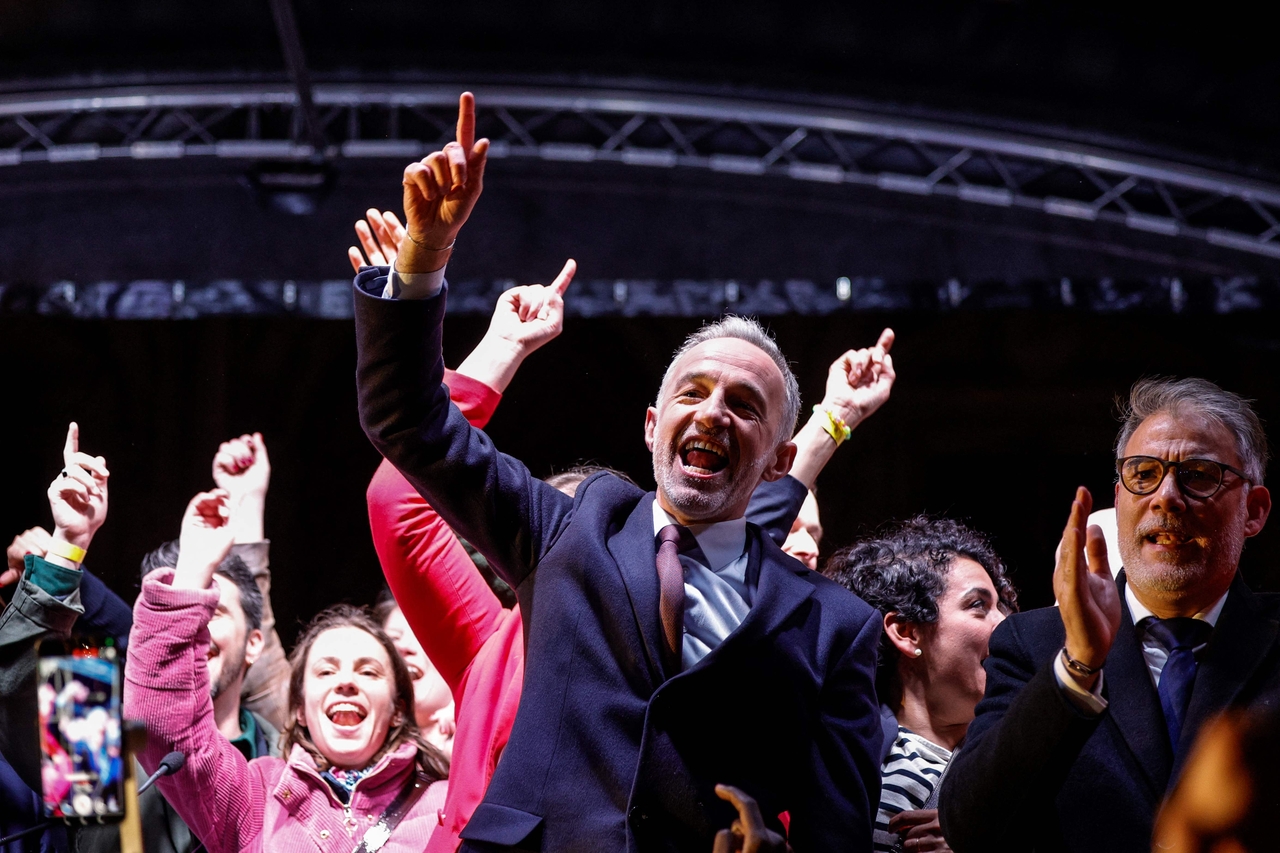 Socialist Party Member of Parliament and left wing Paris mayoral candidate Emmanuel Gregoire (center) celebrates during a gathering in Paris, Sunday. (AFP-Yonhap)