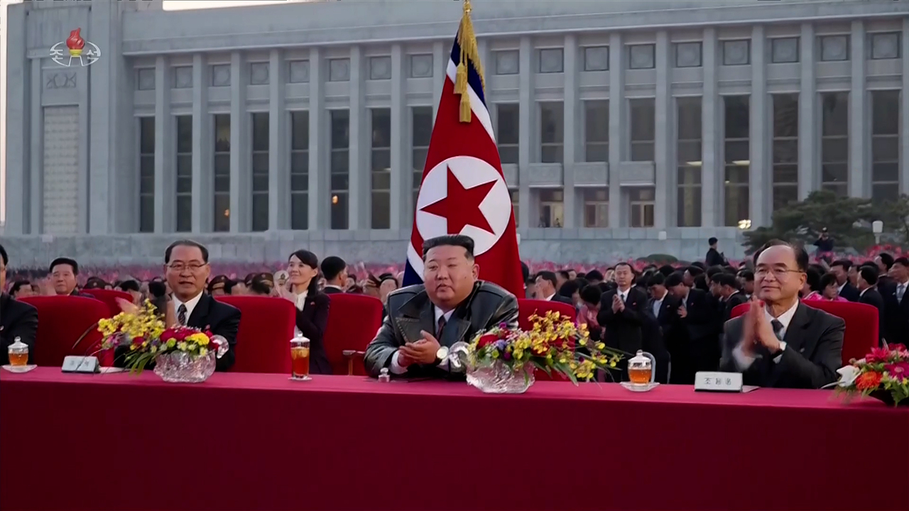 North Korean leader Kim Jong-un (center) watches a performance by artists celebrating the outcomes of the first session of the 15th Supreme People’s Assembly with its deputies at the foot of Mansu Hill on Monday, according to Korean Central Television on Tuesday. (KCTV-Yonhap)