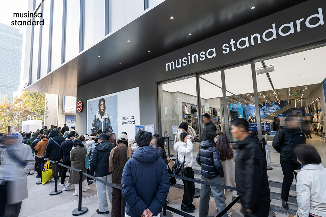 Customers line up outside Musinsa Standard's first Shanghai store on Huaihai Road, which opened in December 2025. (Musinsa)