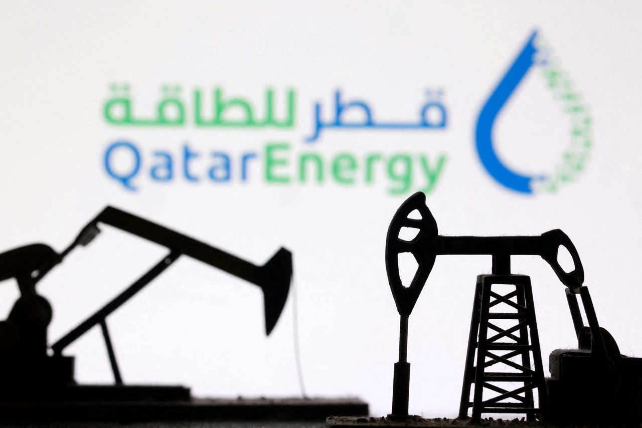 3D-printed oil pump jacks and the QatarEnergy logo appear in this illustration taken March 2, 2026. Reuters-Yonhap