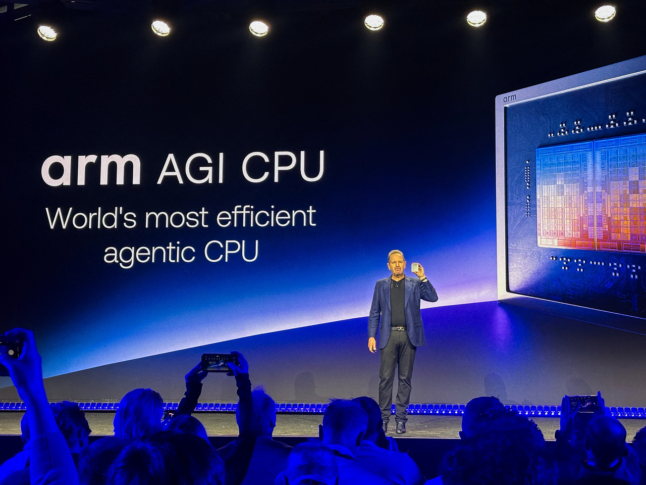 Arm Holdings CEO Rene Haas holds up the company's AGI CPU during an event in San Francisco on Tuesday.   Reuters-Yonhap