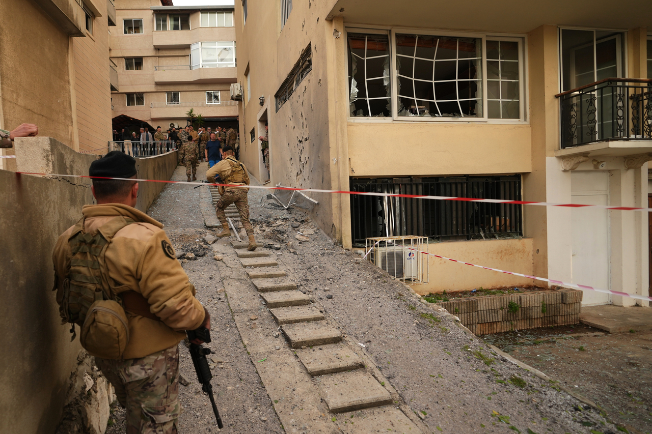 Lebanese army soldiers check the site where intercepted missiles fell in Sahel Alma, north of Beirut, Lebanon, Tuesday. (AP-Yonhap)
