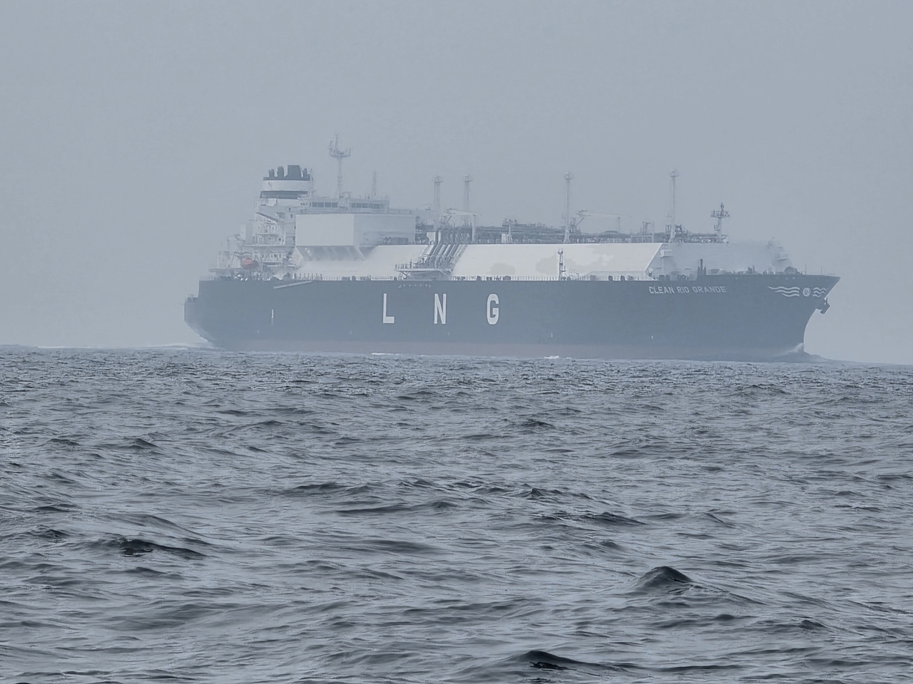 An LNG carrier is seen floating in the sea near Samcheok, Gangwon Province, on March 25. (Yonhap)