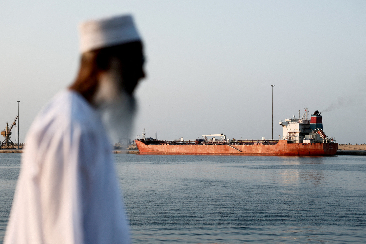The Callisto tanker sits anchored in Port Sultan Qaboos as the traffic is down in the Strait of Hormuz, amid the U.S.-Israeli conflict with Iran, in Muscat, Oman, March 12. (REUTERS/Benoit Tessier)