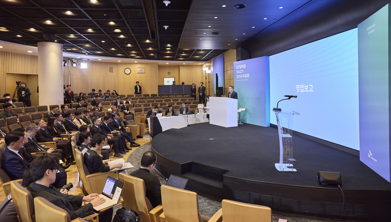 Attendees, including board members and shareholders of SK Telecom, take part in the company’s 42nd annual general meeting in Seoul, Thursday. (SK Telecom)