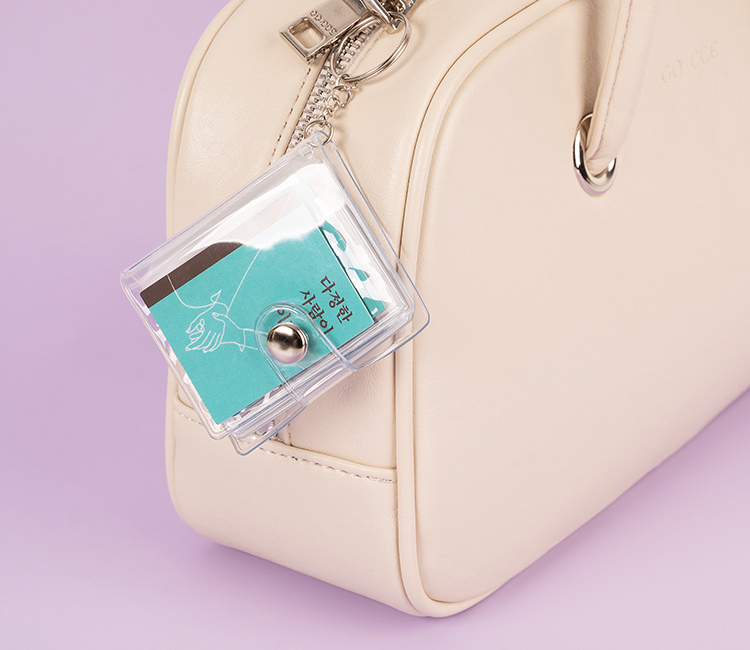 "A Kind Person Wins" book bag charm (Feelm)