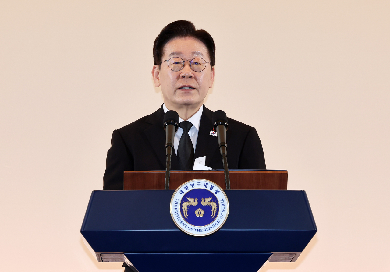 President Lee Jae Myung delivers a speech during a luncheon meeting with families of the victims of the Jeju April 3 massacre on the southern island on Sunday. (Yonhap)