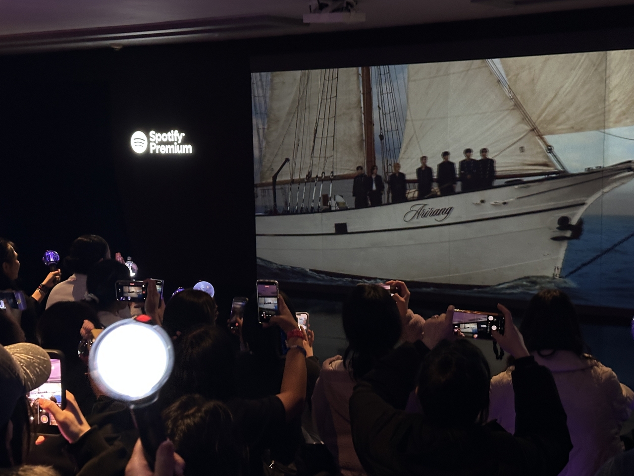 ARMYs sing along and wave their Army Bombs during a special performance of BTS' 