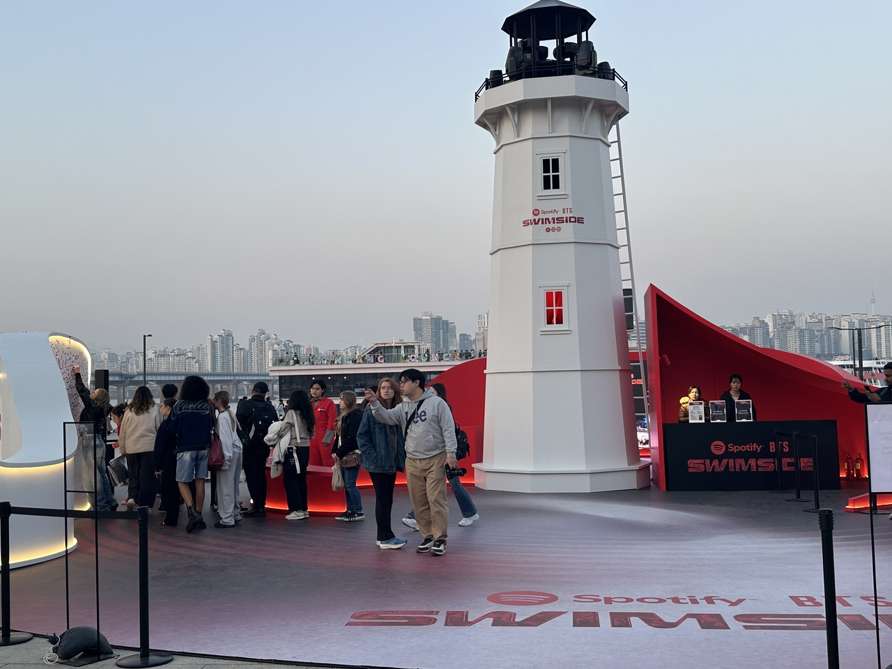 The Spotify Lighthouse pop-up event at Yeouido Hangang Park offered a vibrant space for BTS fans to celebrate the new album.