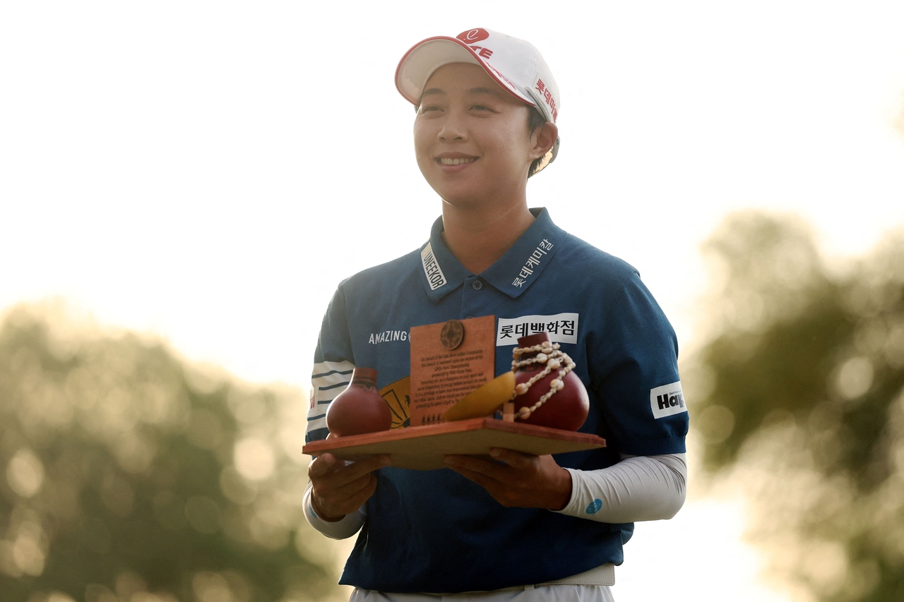 Kim Hyo-joo of South Korea poses with the champion's trophy after winning the Ford Championship on Cattail Course at Whirlwind Golf Club in Phoenix on Sunday. (Getty Images)