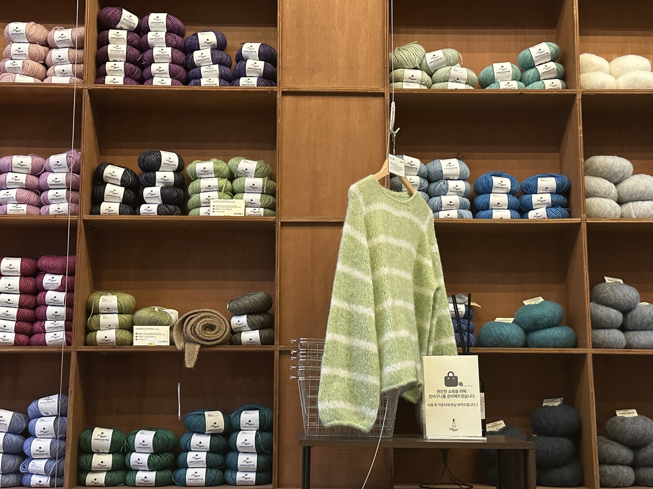 A collection of yarn for sale is on display at Cafe Merino in Seongdong-gu, eastern Seoul. (Lee Jung-joo/The Korea Herald)