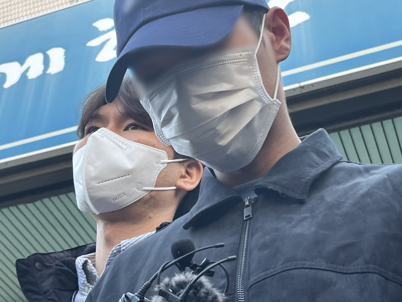 The male suspect, in his 20s, is escorted to a court for a hearing on his arrest warrant on April 2, in Daegu. (Yonhap)