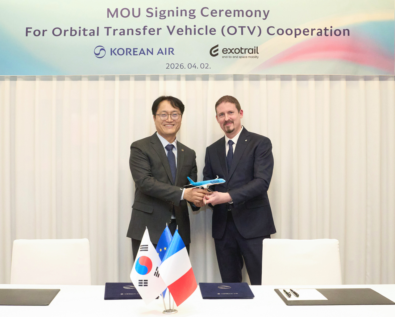 Representatives from Korean Air and Exotrail pose for a photo after signing a memorandum of understanding to co-develop an orbital transfer vehicle in Seoul on Friday. (Korean Air)
