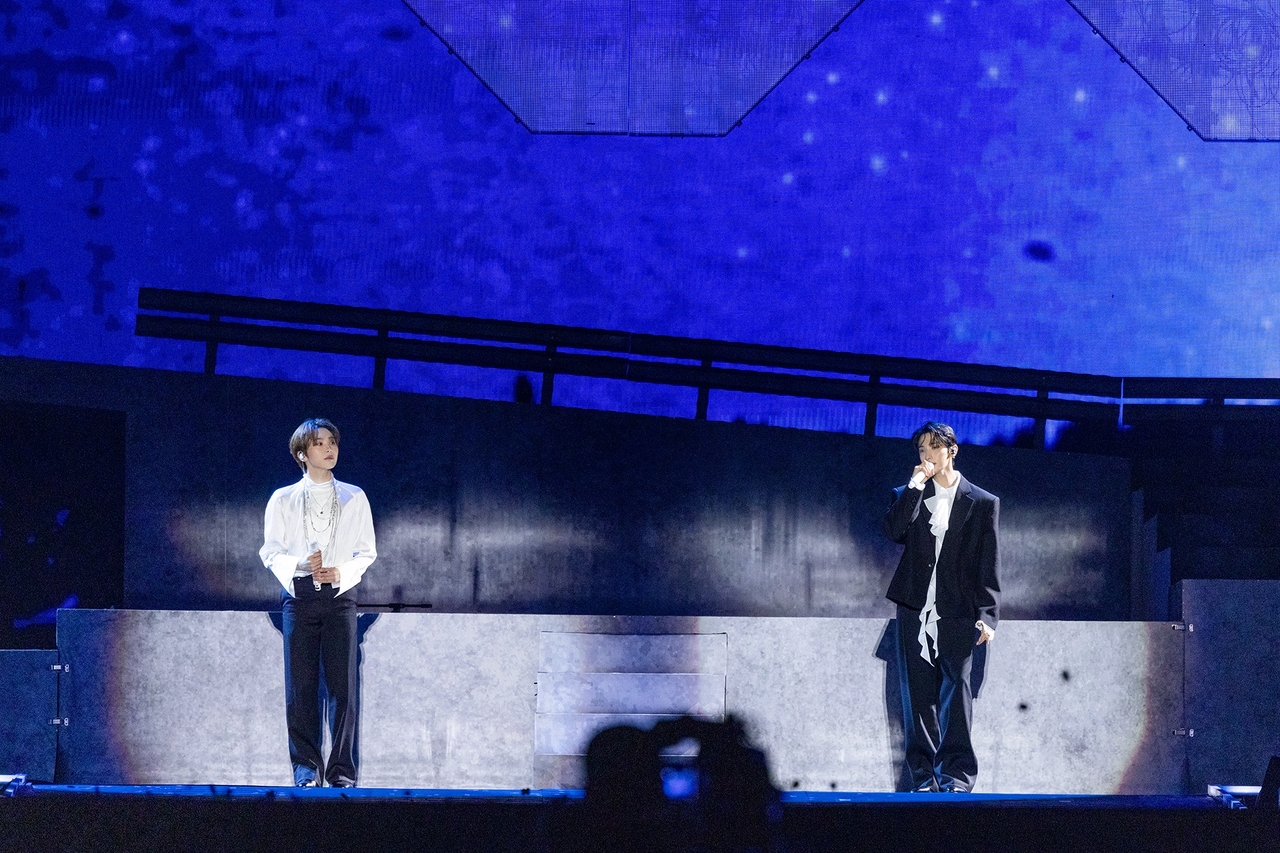 DK (right) and Seungkwan perform 