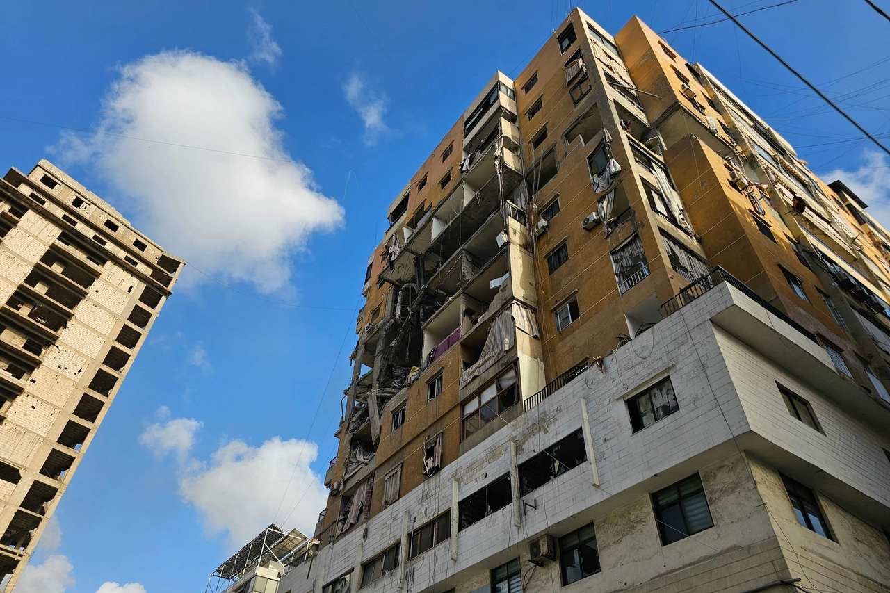 Damage is seen at the site of an Israeli airstrike in Beirut's southern suburbs on Sunday. (AFP-Yonhap)