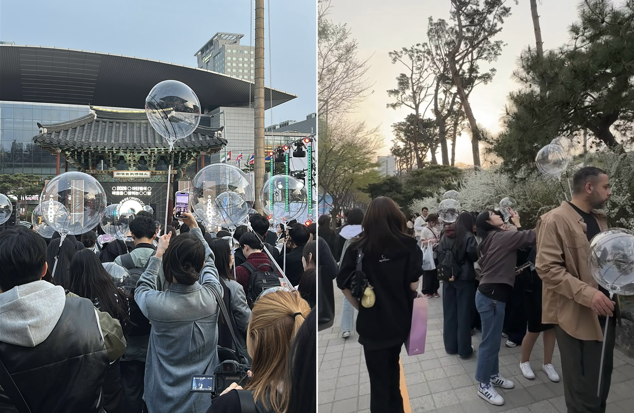 Rhythm, Faith, and Technology: 250,000 Attend Buddhism Expo, Driven by Gen Z Enthusiasm 14 Left: Visitors gather near the stage 10 minutes before the event begins. Right: A long line forms at 6:20 p.m., about 40 minutes ahead of the party at Bongeunsa. (Tammy Park/The Korea Herald)