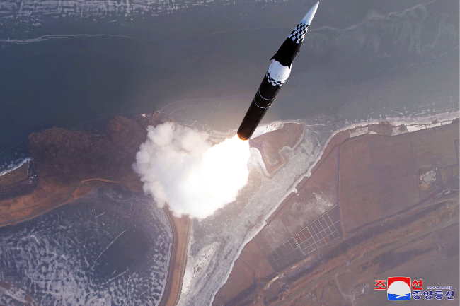 A new intermediate-range ballistic missile tipped with a hypersonic warhead is launched on Jan. 6, in this file photo. (Korean Central News Agency via Yonhap)