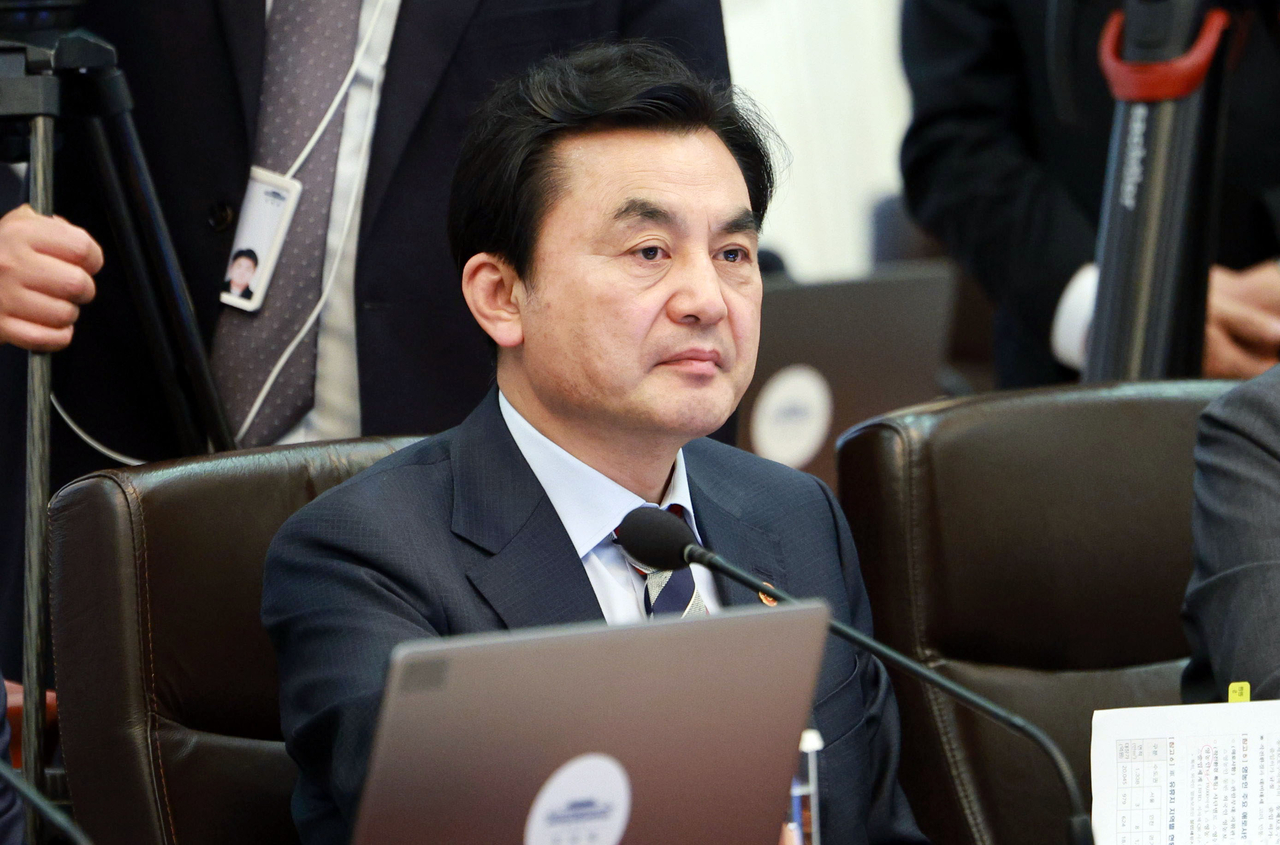 Defense Minister Ahn Gyu-back listens to remarks during a Cabinet meeting doubling as an emergency economic review meeting at Cheong Wa Dae on Monday. (Pool Photo via Yonhap)