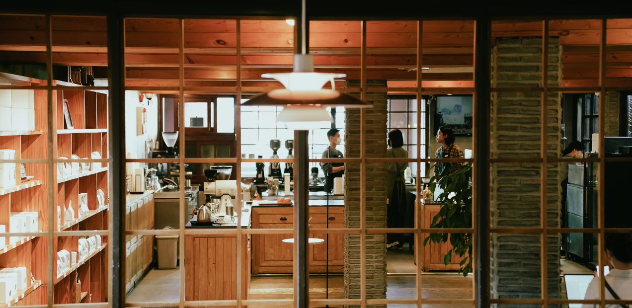 Momos Coffee Flagship Store in Busan featuring a wood-toned interior and bamboo courtyard, one of two Korean cafes named to The World's 100 Best Coffee Shops 2026