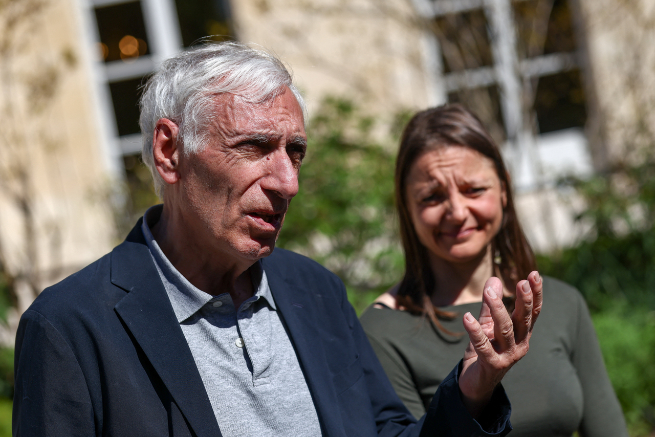 Jacques Paris (left) and Cecile Kohler speak to journalists in Paris, Wednesday. (Reuters-Yonhap)