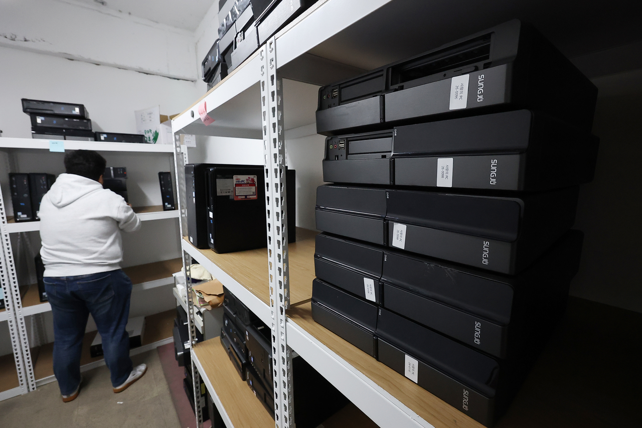 Computers to be provided to vulnerable groups are stored at the Seoul Metropolitan Government’s “PC for Love” Support Center in Seongbuk-gu, Seoul, on April 9. (Yonhap)
