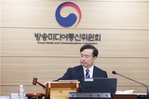 Kim Jong-cheol, chairperson of the Korea Media and Communications Commission, presides over the commission's regular meeting in Gwacheon, just south of Seoul, on Friday. (Yonhap)